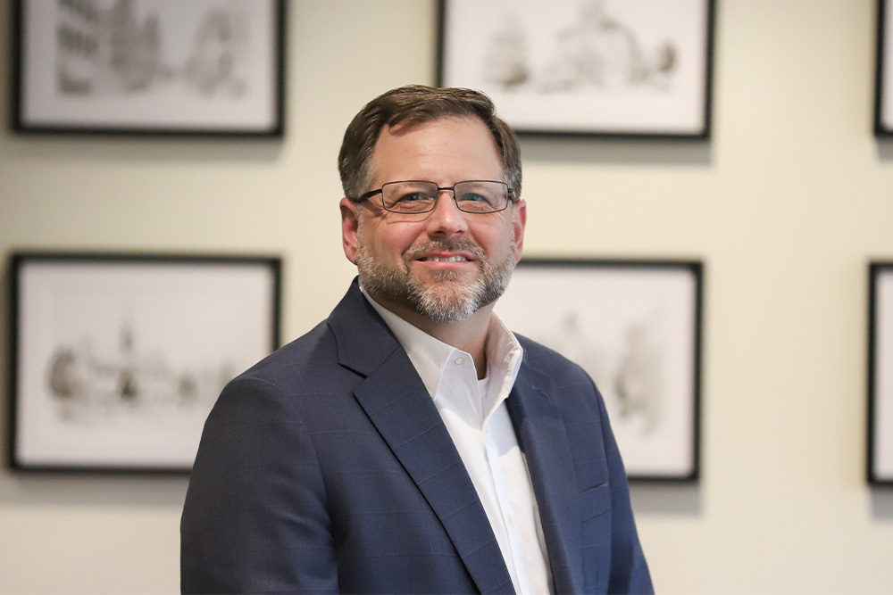 Barry D. Smith, President/CEO of DCCU, smiles for the camera