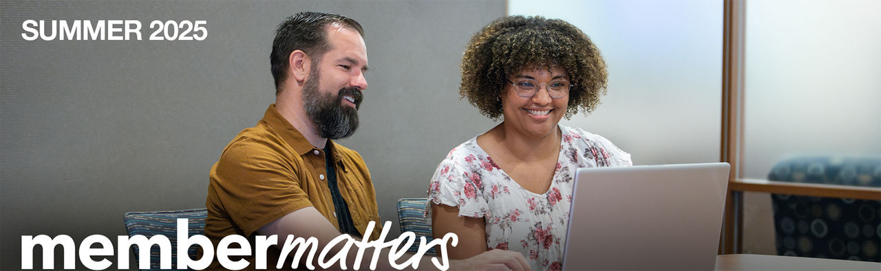 Summer 2025 Member Matters | Couple looking at laptop together