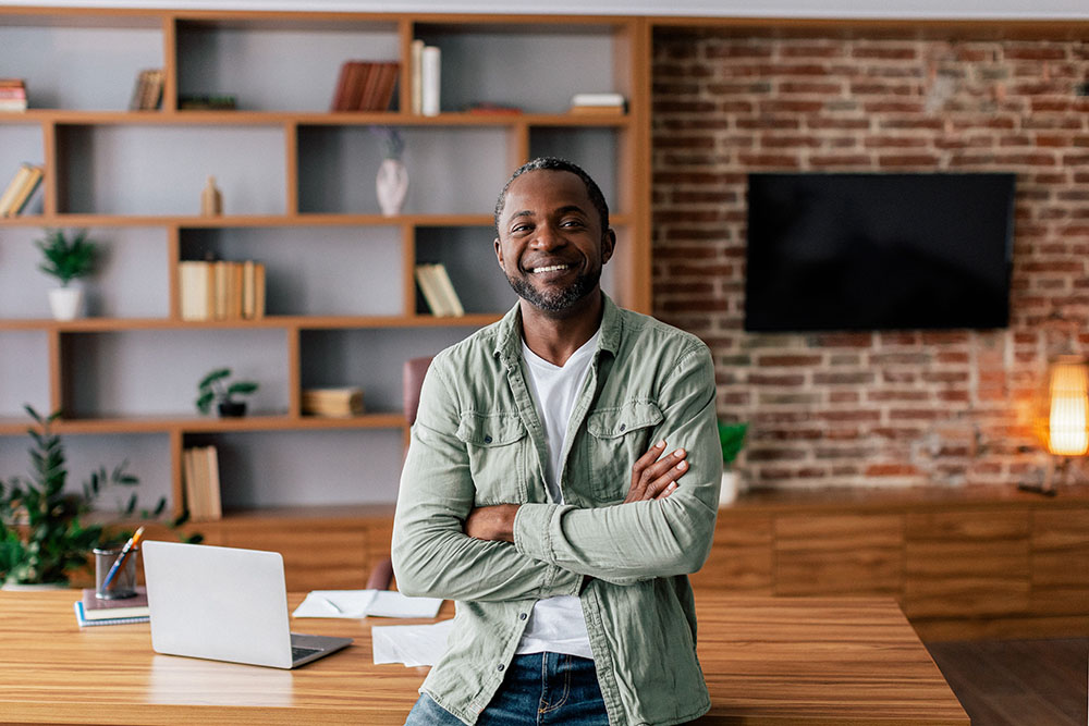 Middle aged man standing in office