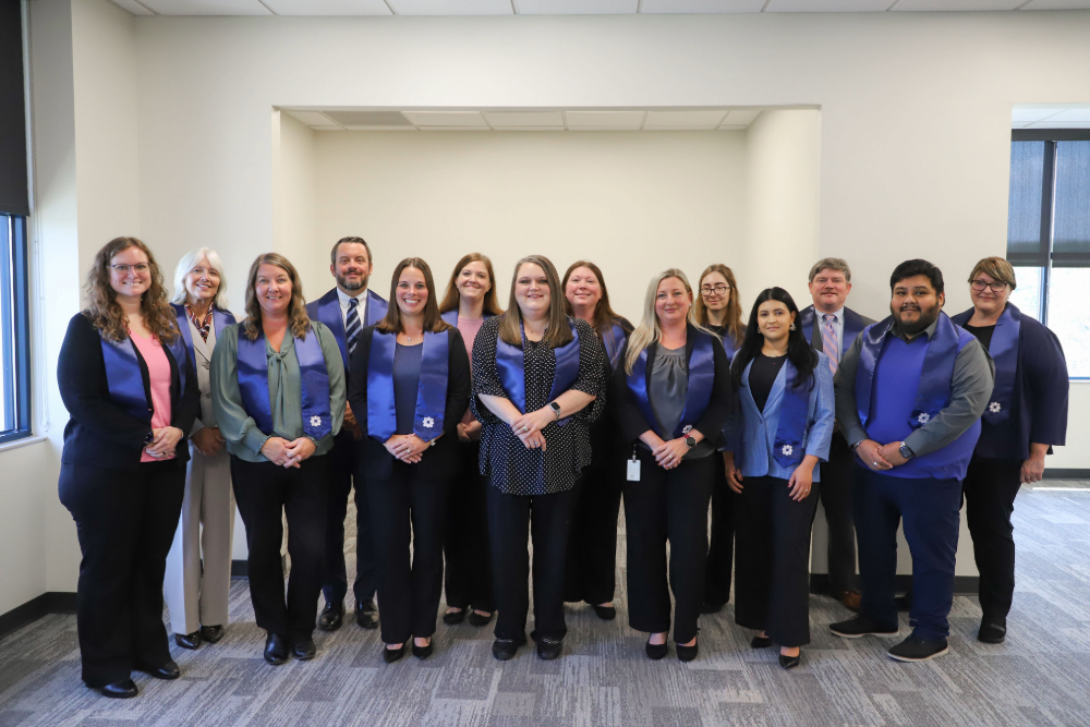 The newest group of DCCU leaders to graduate the Leadership Impact Journey program. 