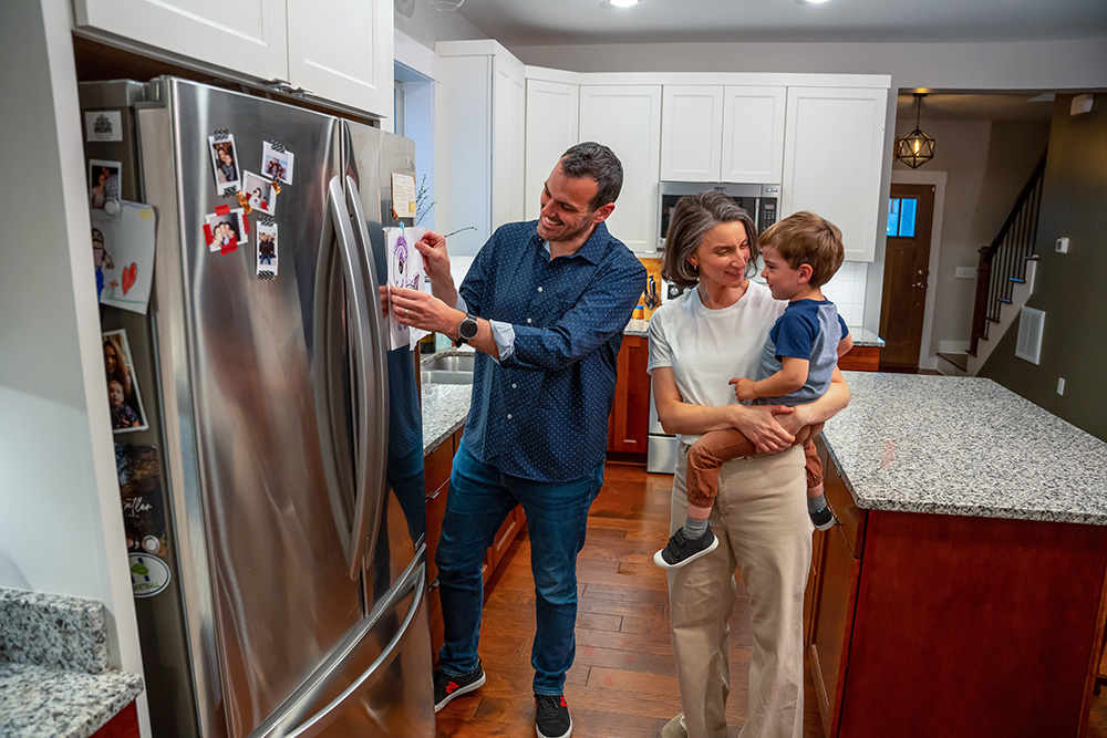 Family of 3 in the kitchen