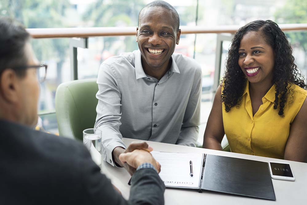 couple meeting with financial advisor