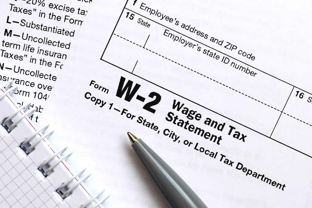 W-2 Statements and a pen