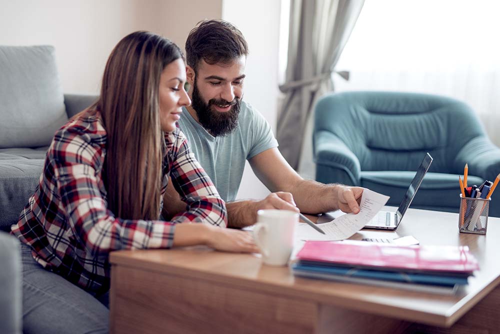 couple reviewing financial documents together