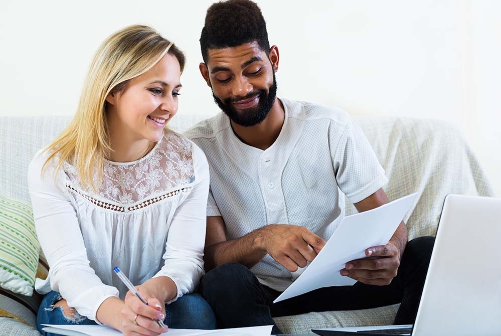 couple reviewing financial documents together