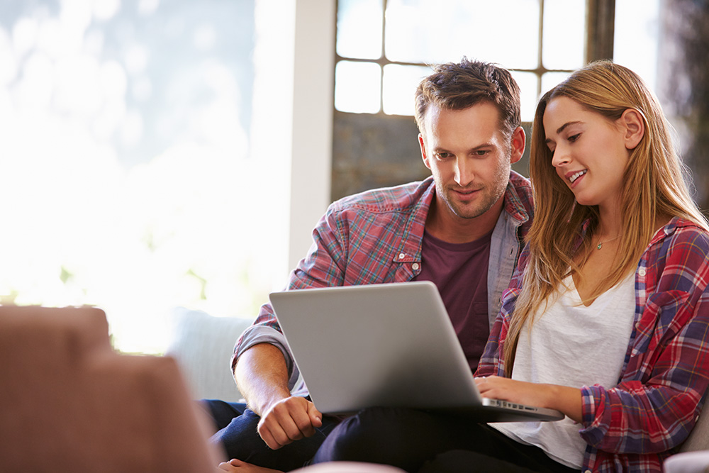 couple looking at laptop together